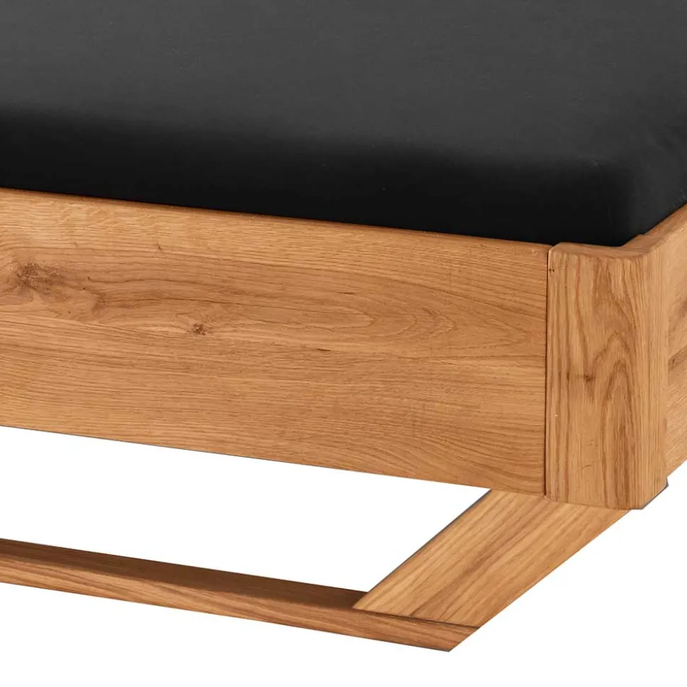 Bett mit Holzkufe Tamyno